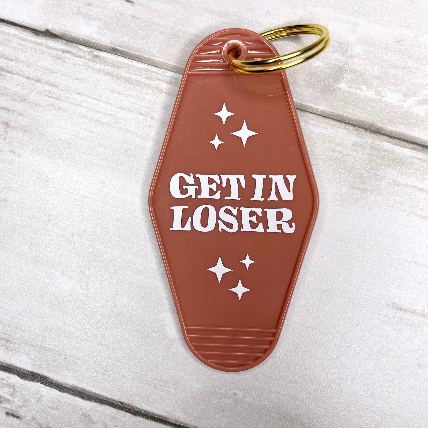 Get In Loser Motel Keychain